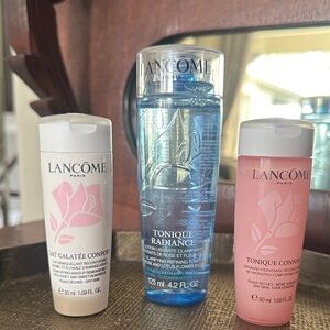 Lancome Tonique Radiance Blue Toner with Pink & White Lancome Travel Bottles.